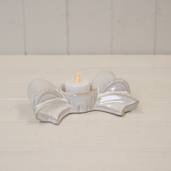 Original product photograph of the natural ceramic bow tealight candle holder