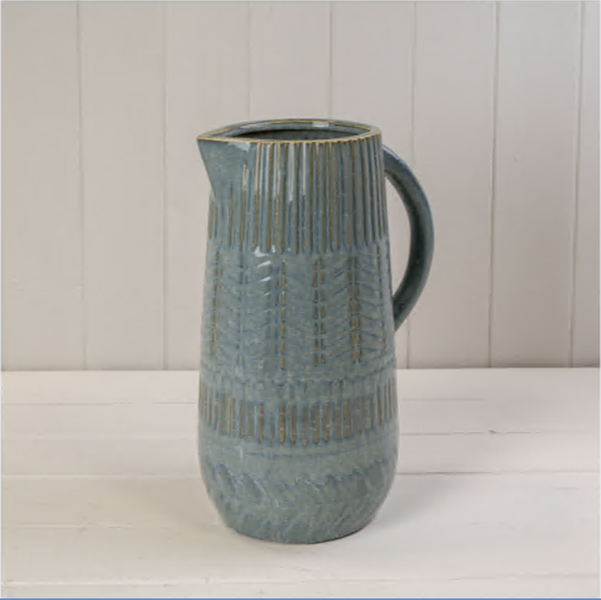 Blue ceramic jug by Satchville, featuring a glossy finish and classic shape, perfect for serving or decorative use.
