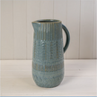 Blue ceramic jug by Satchville, featuring a glossy finish and classic shape, perfect for serving or decorative use.