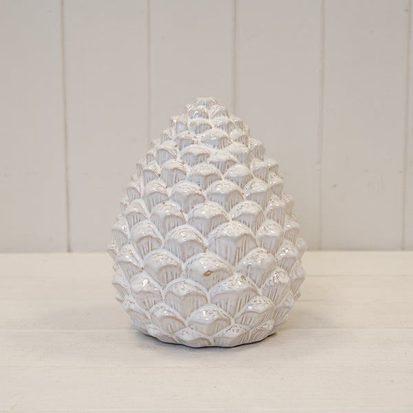 Large natural ceramic pinecone decoration with ivory glaze and layered ridged scales