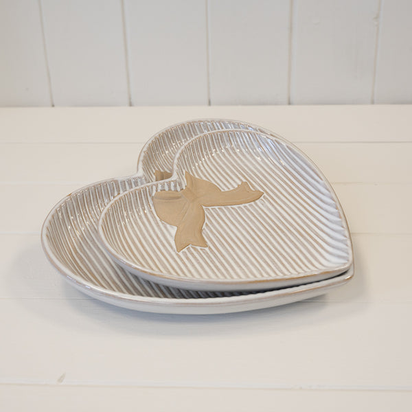 Satchville medium heart plate with decorative bow detail, white ceramic kitchen and dining dish