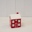 Red ceramic LED heart-shaped house for Christmas decor by Satchville, featuring a cozy festive design with glowing lights.