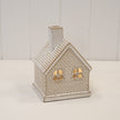 White ceramic LED light-up cottage for Christmas decoration, crafted by Satchville, featuring a cozy festive design.