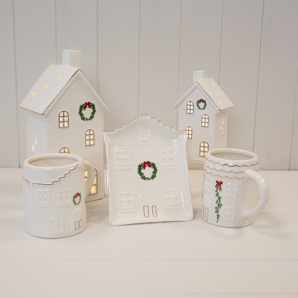Satchville cozy Christmas house plate with festive holiday design, ideal for holiday decor or serving treats during Christmas celebrations.