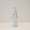 Tall off-white textured metal angel tealight holder, 32cm high, with layered wings and a cup above its round head; original front view.