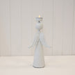 Tall off-white textured metal angel tealight holder, 32cm high, with layered wings and a cup above its round head; original rear view.