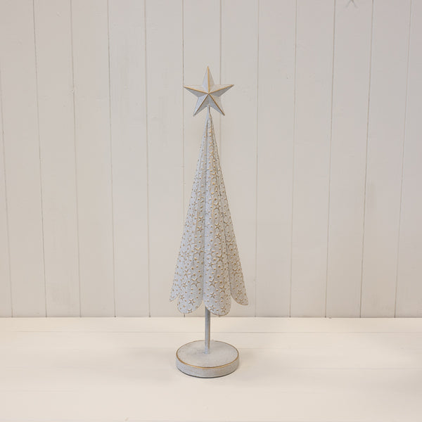 Large white metal Christmas tree with gold star detailing and round base