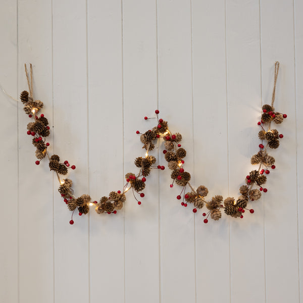 Satchville Christmas LED garland with pinecones and red berries, ideal for holiday decorating and festive home decor.