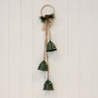 Hanging forest green Christmas bells on decorative hoop