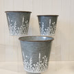 Set of Three Rustic metal planters with Meadow design