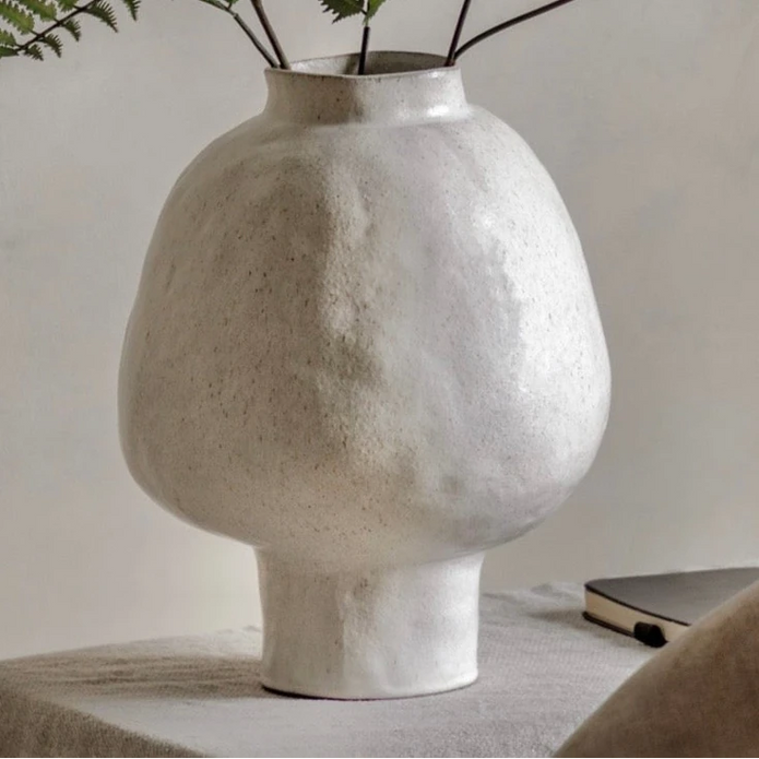 White stoneware footed vase with a neutral finish, designed by Gallery Direct for elegant home décor.