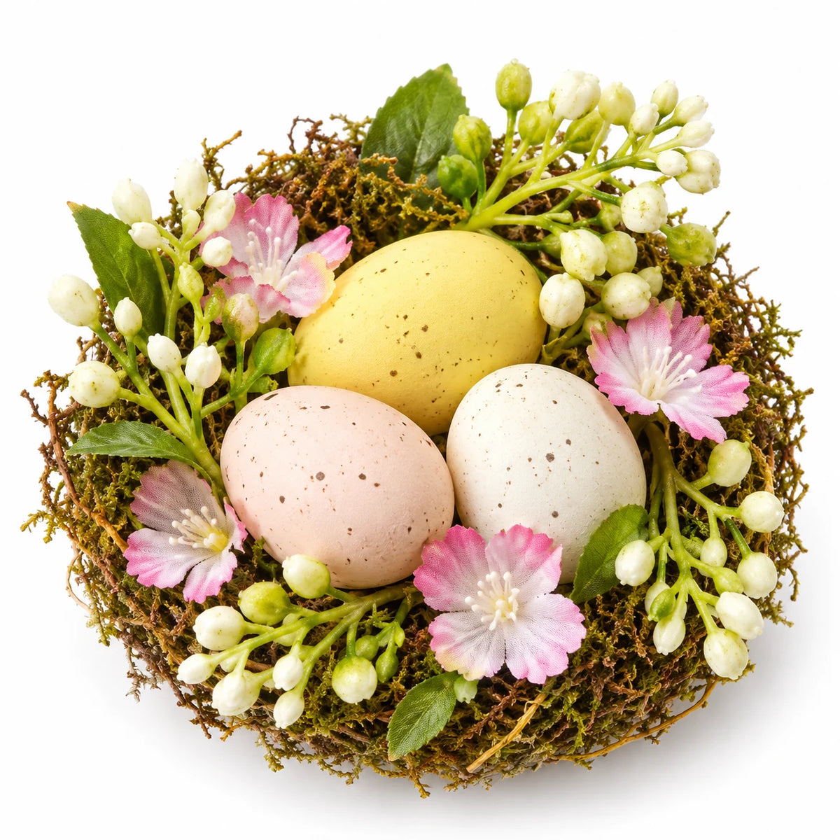 Close-up of pastel speckled decorative eggs, pink flowers and green foliage in one nest from the set of two.