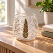 Glass botanical tealight candle holder with Christmas-inspired design by Ancient Wisdom, featuring intricate botanical details.