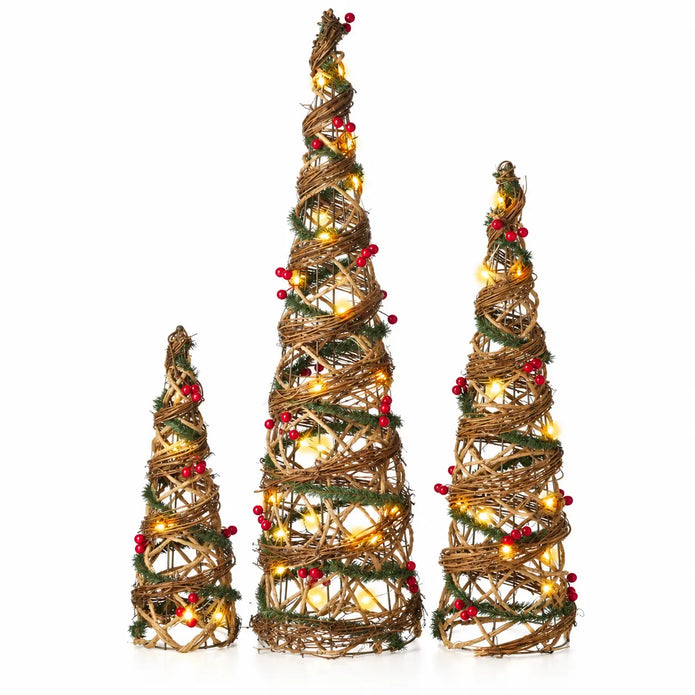 Rattan LED Christmas trees showing natural weave greenery and red berries on white