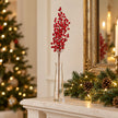 60cm Red Berries Stem in a clear vase on a festive mantel