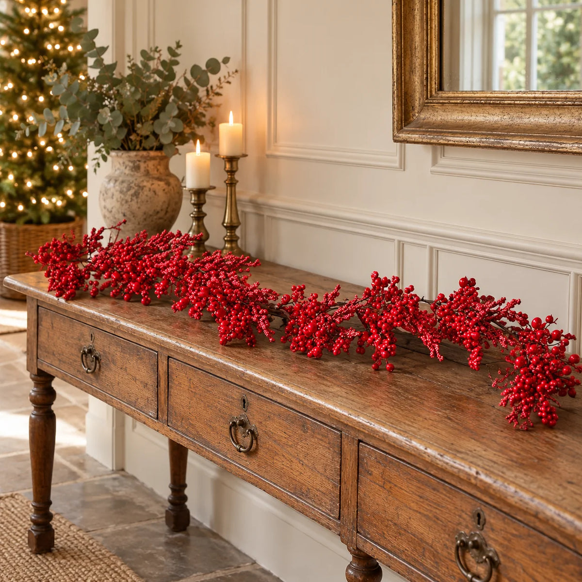Red Berry Burst Luxury Garland arranged on an oak console