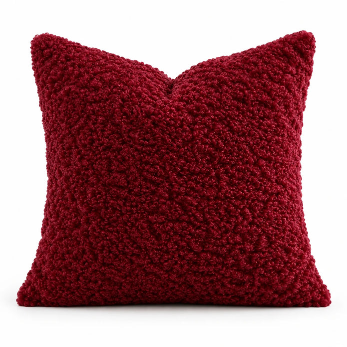 Front studio view of the red burgundy bouclé cushion cover
