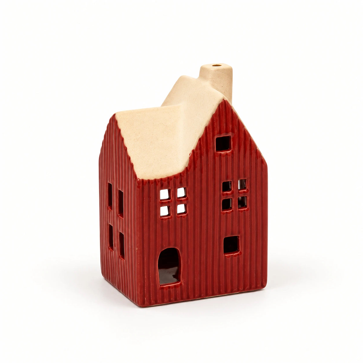 Red ceramic house tealight holder with cream roof, full studio view