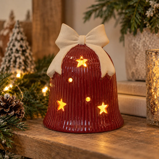 Red ceramic Christmas bell with LED lights from Satchville, festive holiday decoration with illuminated design.