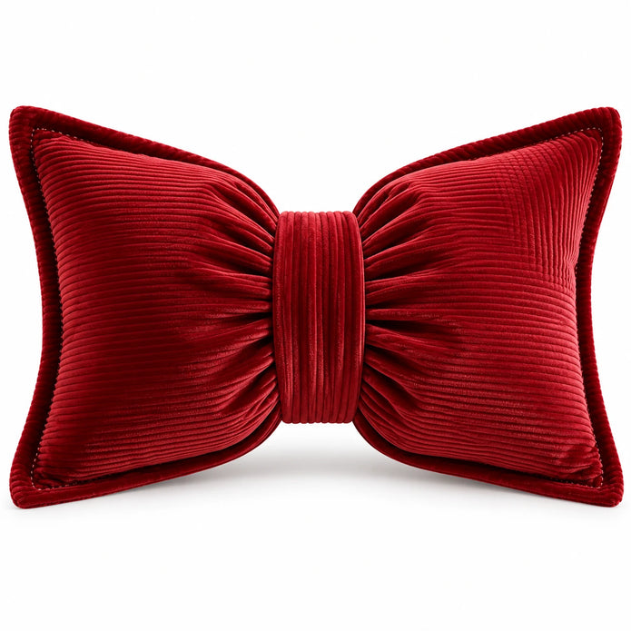 Front studio view of the red corduroy striped bow cushion on a white background.