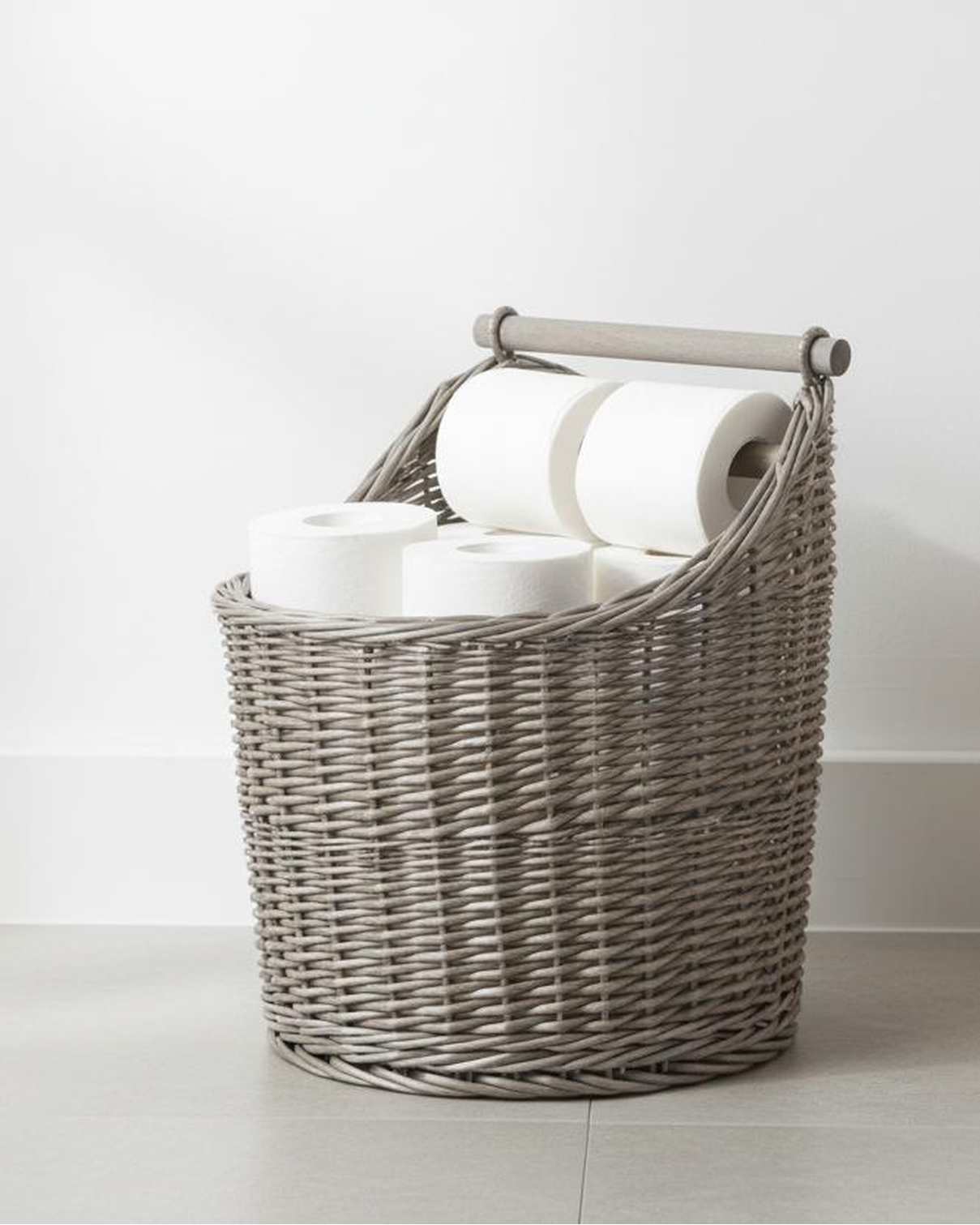 Wicker toilet roll holder basket in natural finish, stylish home decor by Red Hamper, perfect for bathroom organization and decor.