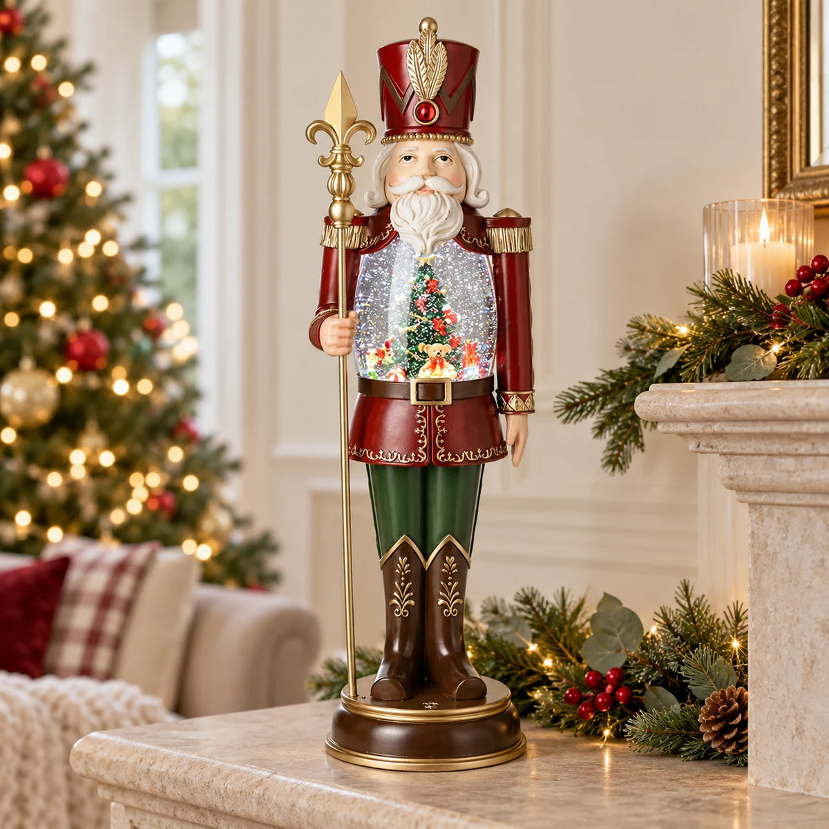 Red nutcracker LED snow globe on a stone surface beside Christmas greenery