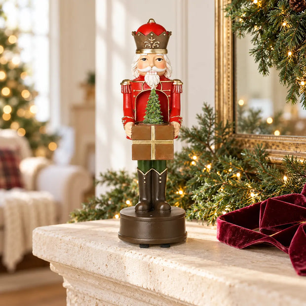 Red musical soldier Christmas decoration on stone mantel with garland