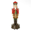 Full red spinning and musical soldier Christmas decoration on white background