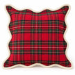 Angled studio view of red tartan cushion cover showing woven texture and cream border