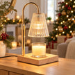 Widdop & Co candle warmer lamp with textured reeded glass shade, shown illuminated over a candle