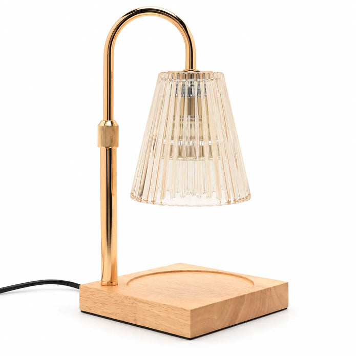 Widdop & Co candle warmer lamp with reeded glass shade on a studio background