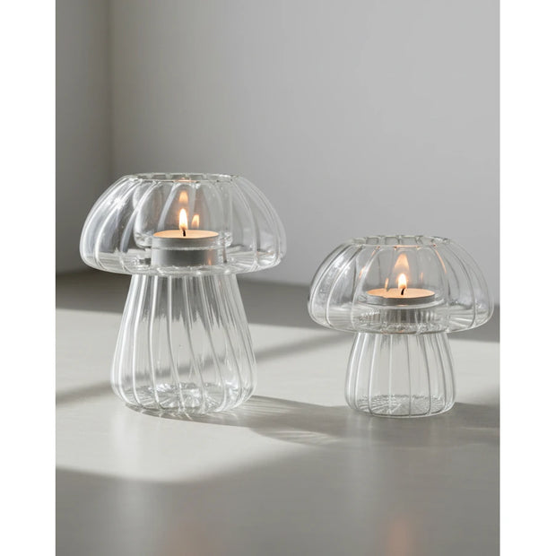Spring ribbed glass mushroom tealight candle holders by Wikholmform, featuring a delicate mushroom design for cozy ambiance.