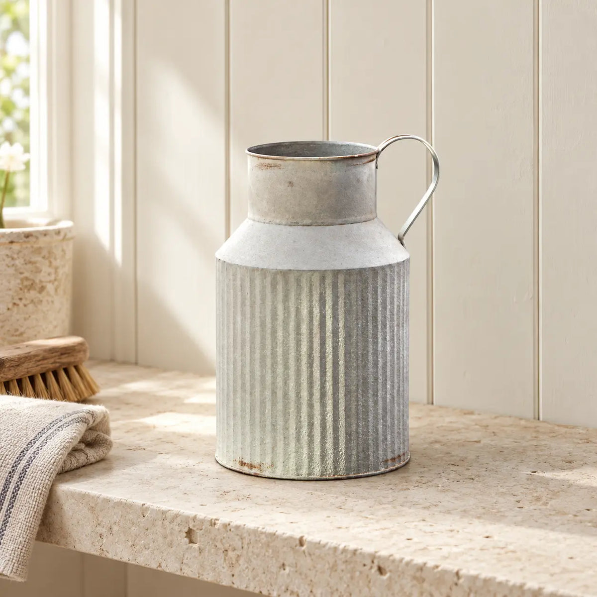 Satchville ribbed metal vase with a textured surface, ideal for pantry or decorative settings.