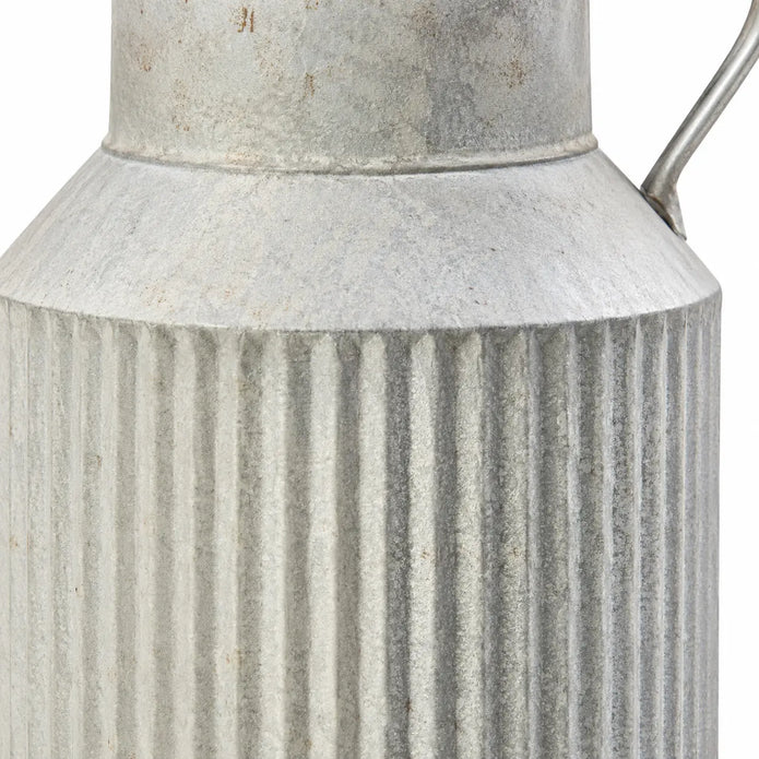 Satchville ribbed metal vase with vertical ribbed design, showcasing a sleek, modern appearance for decorative floral arrangements.
