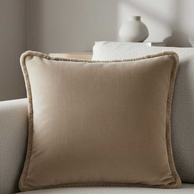 Beige Freya velvet cushion cover by Riva Home featuring soft fabric and elegant design for cozy home decor.