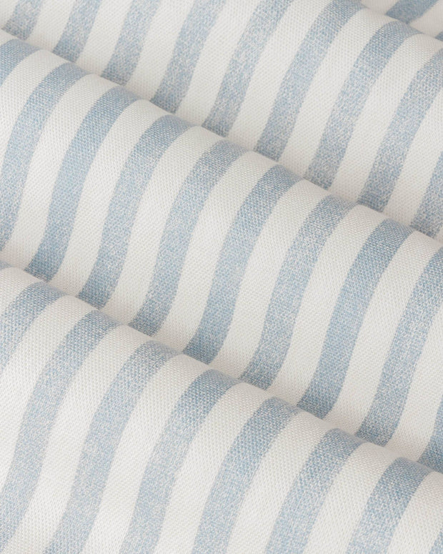 Ocean blue striped blackout eyelet curtains by Riva Home, soft furnishings with eyelet top design for stylish window coverage.