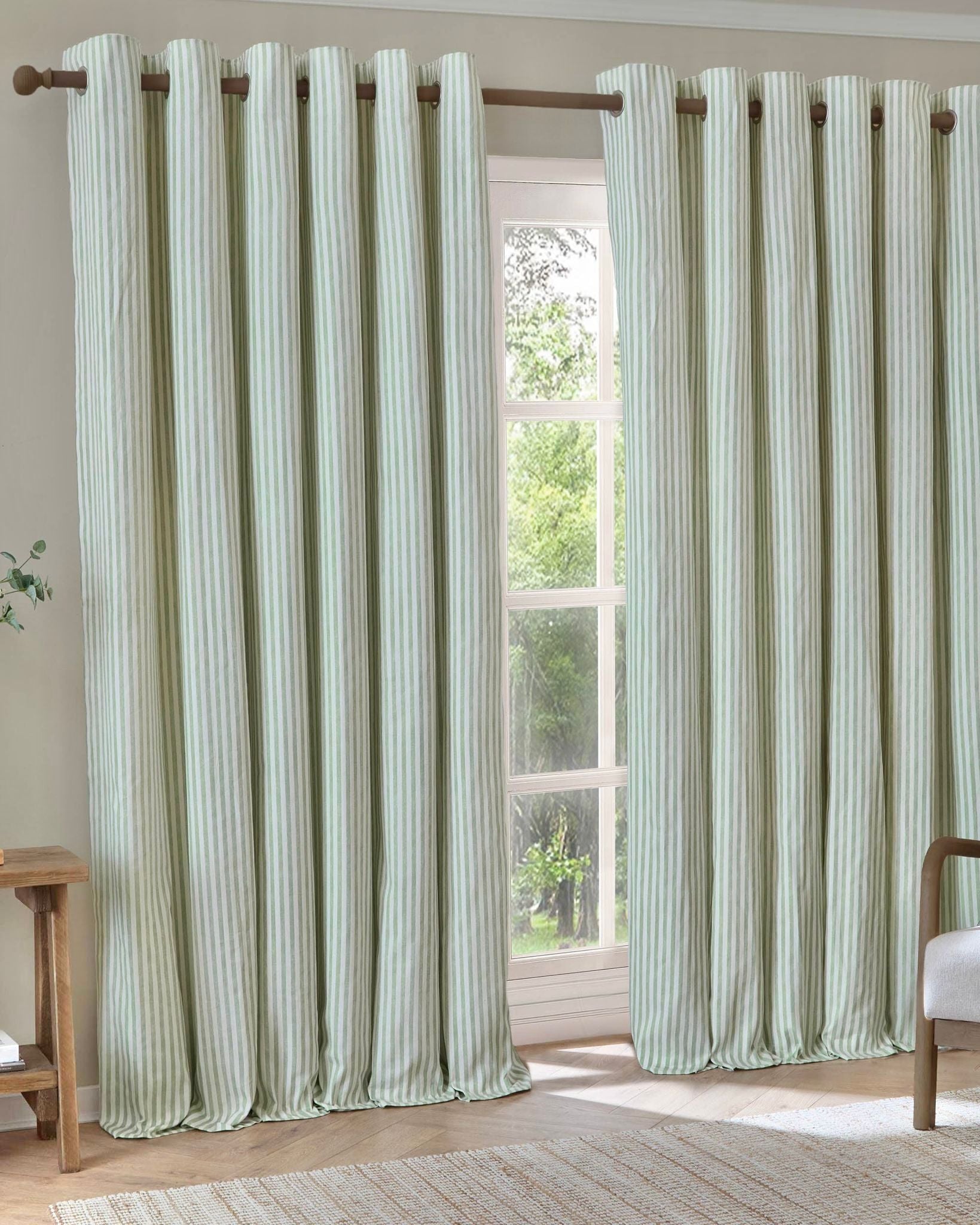 Sage green striped blackout eyelet curtains by Riva Home, soft furnishings, 117cm wide and 137cm high, ideal for light control and privacy.