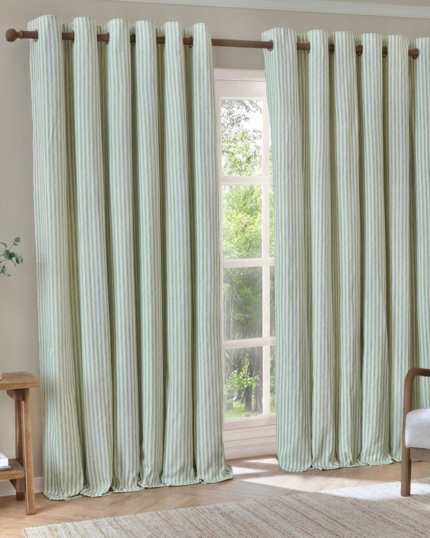 Sage green striped blackout eyelet curtains by Riva Home, soft furnishings, 117cm wide and 137cm high, ideal for light control and privacy.
