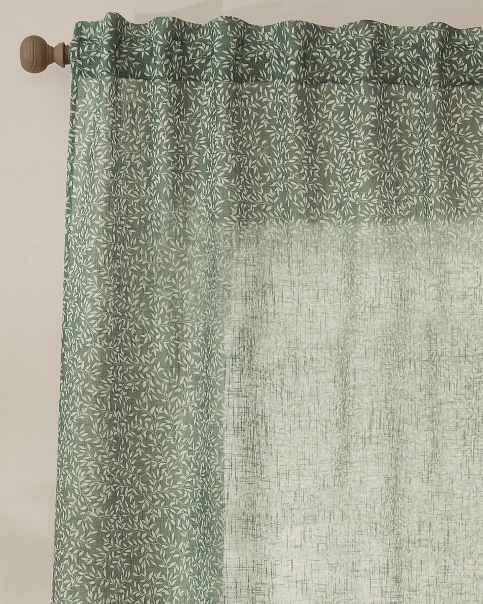 Green woven sheer voile curtain panel with yard leaf pattern, soft furnishings by Riva Home, 140cm wide by 250cm long.