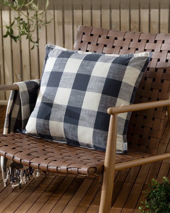 Navy blue check outdoor garden seat scatter cushion cover by Riva Home, soft furnishings for outdoor seating.