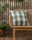 Olive green check outdoor garden seat scatter cushion cover by Riva Home, soft furnishings for outdoor seating.