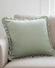 Sage green Ruffle Matte Velvet Cushion Cover from Riva Home, soft furnishings with ruffle detail and velvety texture.