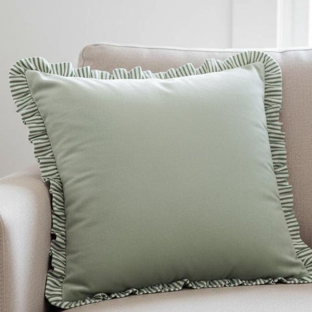 Sage green Ruffle Matte Velvet Cushion Cover from Riva Home, soft furnishings with ruffle detail and velvety texture.