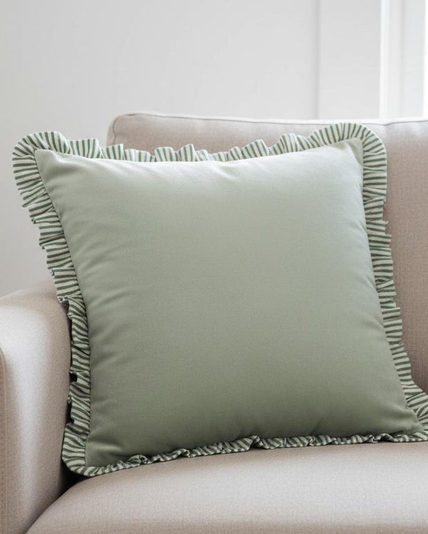 Sage green Ruffle Matte Velvet Cushion Cover from Riva Home, soft furnishings with ruffle detail and velvety texture.