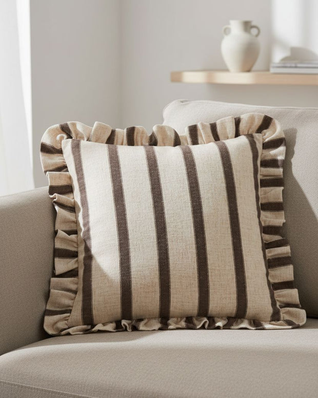 Chocolate brown cushion cover with square stripes and ruffle detail from Riva Home, soft furnishings decor.
