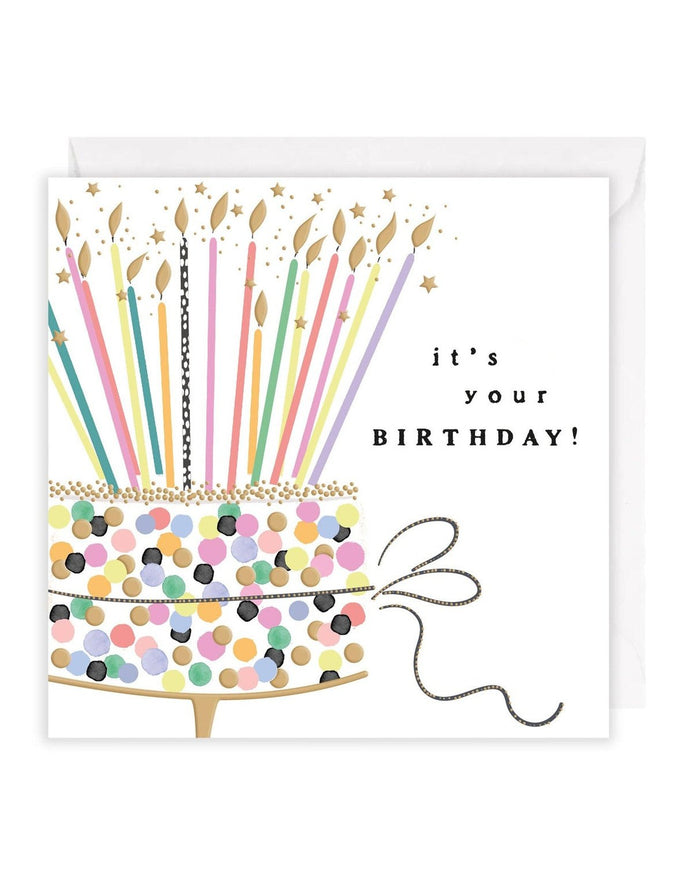 Celebration greeting card featuring a colorful confetti cake with lit candles, by Rosanna Rossi.