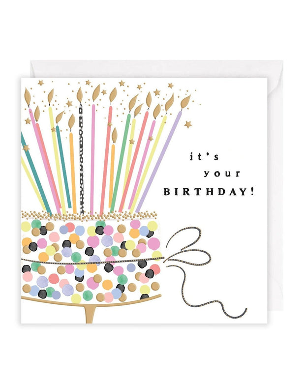 Rosanna Rossi birthday greeting card featuring a confetti cake with lit candles for celebrating special occasions.