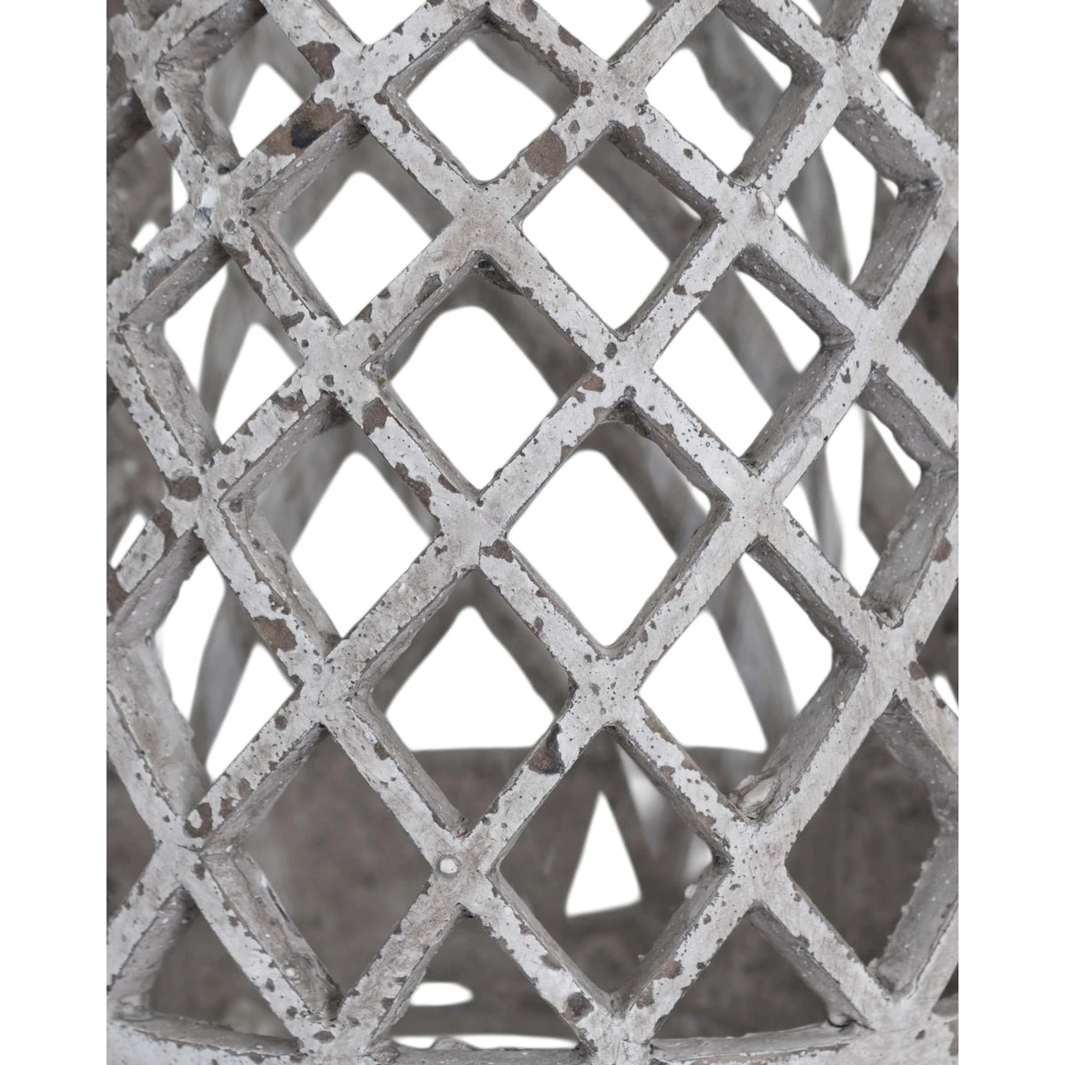 Round stone effect lattice hurricane lantern for home decor, featuring a classic design with cut-out patterns and a glass interior.