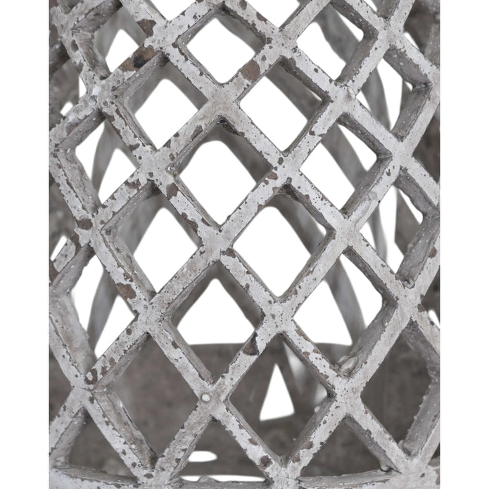 Round stone effect lattice hurricane lantern for home decor, featuring a classic design with cut-out patterns and a glass interior.