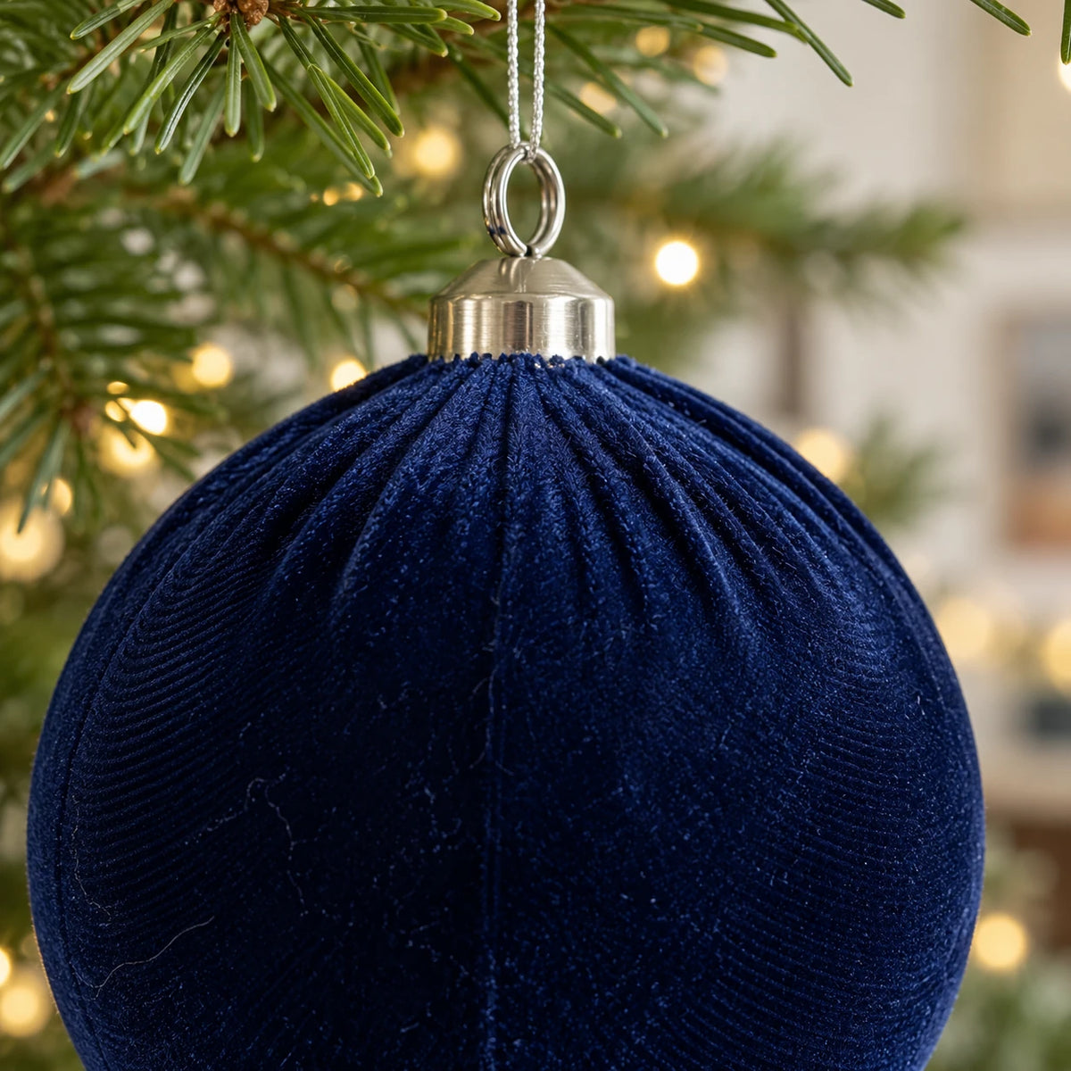 Royal blue velvet Christmas bauble by Starlight Express with a smooth, plush velvet surface and elegant festive design.